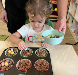 Deni placing the eggs on her nest!