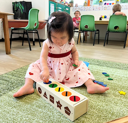 Ellie sorting out the shapes and colours!