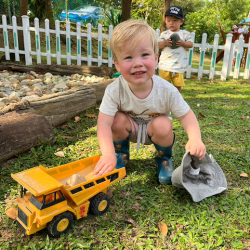 Hugo enjoying playing with the trucks and diggers!