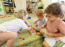 Izzy, Seb and Romy sorting out the coloured shapes