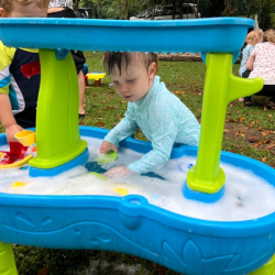 Izzy enjoying our new water play equipment!