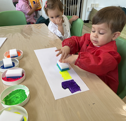 Jasper sponge painting his train!
