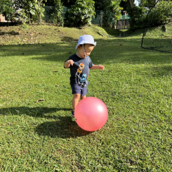 Rowan enjoying kicking the ball!