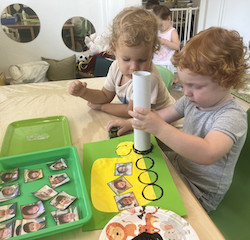 Sebby making his bus! He chose his friends and stamped the wheels!