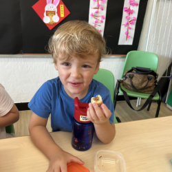Alex enjoying his yummy pineapple ball!