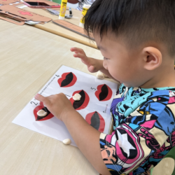 Lincoln working on his counting and number recognition.