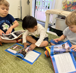 Spencer Lincoln and Alex enjoying a book during break time!