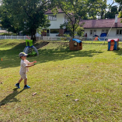 Aidan practicing for egg and spoon race.