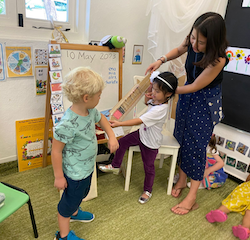 Ena giving Charlie a Vaccination shot for show and tell