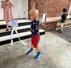 Henry enjoys flying his selfmade kite!