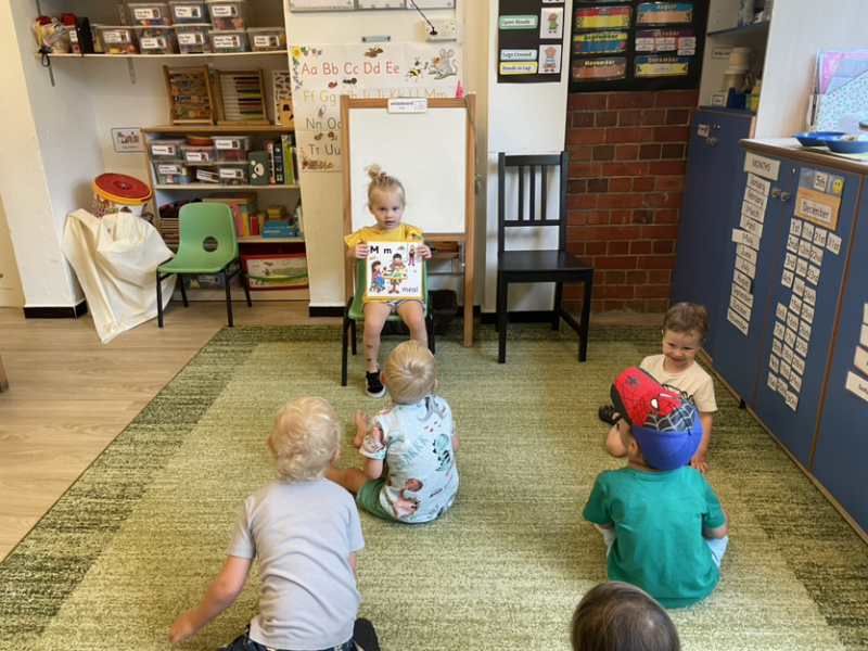 Alex helping during Jolly Phonics class. Letter “m”