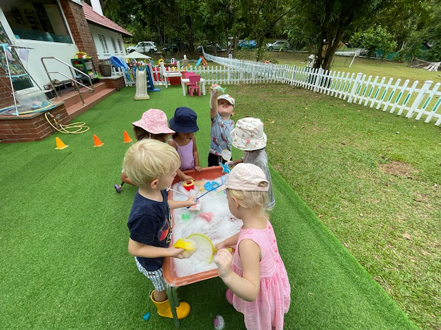 Enjoying the water table together!