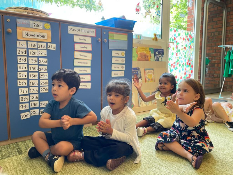 Isaac, Alara, Mia and Savhara singing together.