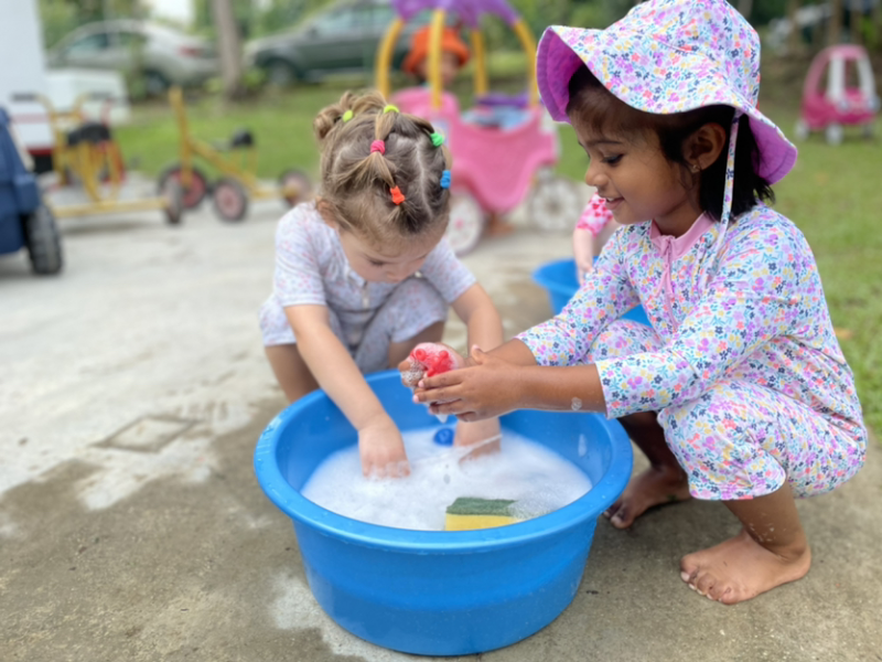 Kaavya and Margot enjoying splash time!