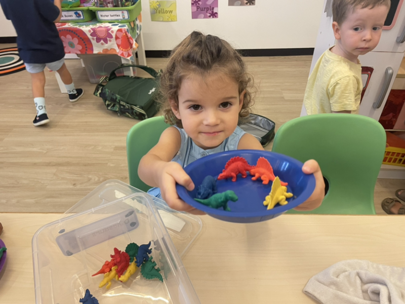 “Look Ms Chris, I made a circle with the dinosaurs!”