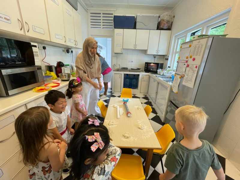 Making Pizza with Alara’s mum, Maha.