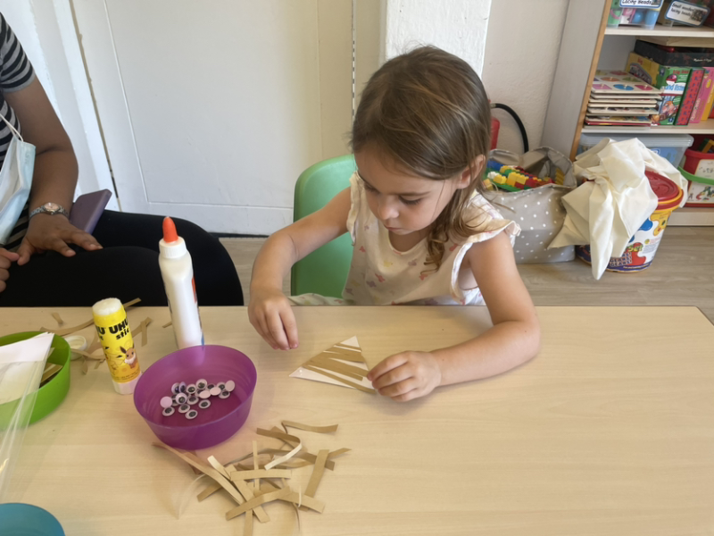 Mia working on Christmas art.
