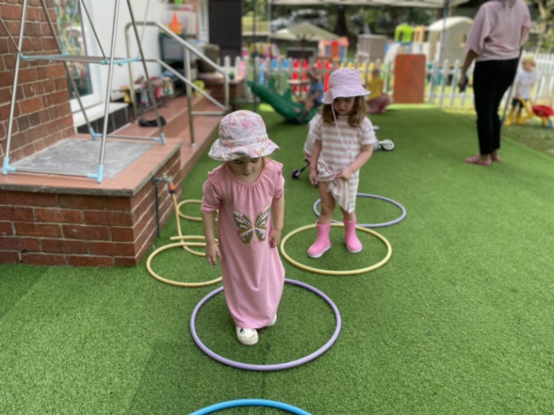 Practising-jumping-in-the-hoops-with-two-feet.-