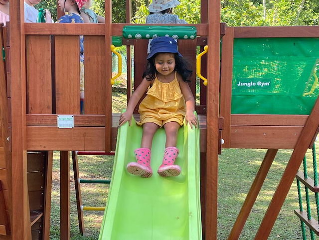 Savhara enjoying the new slide.