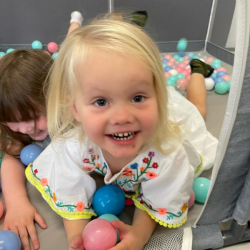 Alex having fun in the soft play room.