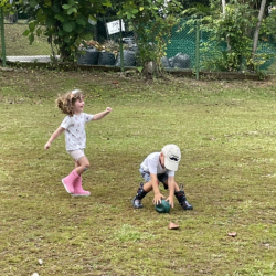 Clemmie and Monty playing football together.