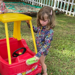 Clemmie is washing up the car