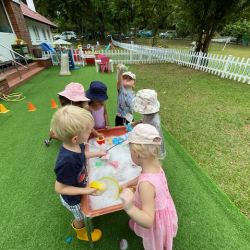 Enjoying the water table together!