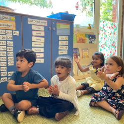 Isaac, Alara, Mia and Savhara singing together.