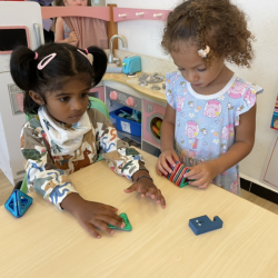 Kaavya and Lydia playing together during free play.