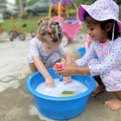 Kaavya and Margot enjoying splash time!