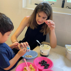 Making yogurt sundaes with Clemmie’s mum for cookery today.