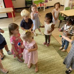 Music and dancing time. Using the egg shakers and dancing to The Freeze Song.