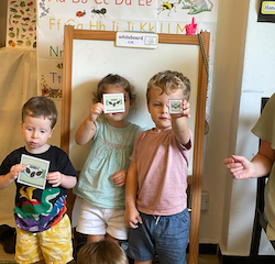 George, Margot and Dylan learning maths concepts of small, medium and large.