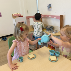 Isla and Isabelle enjoying a tea party.