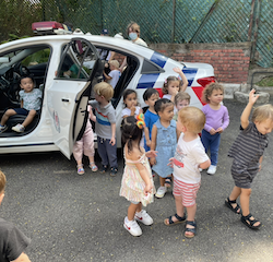 Meeting the police officers and seeing their police car.