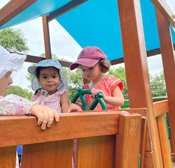 Poppy, Leela and Margot playing on the pirate ship.