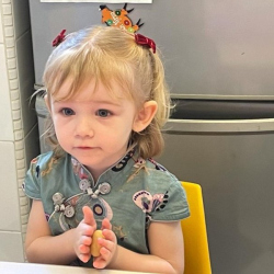 Isla making pineapple tats!