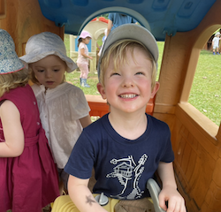 Asher having fun during outside play.