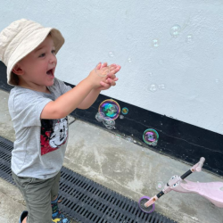 Ben loves playing with bubbles!