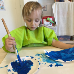 Raif painting his car.