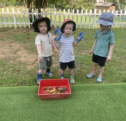 Thomas-George-and-Asher-collecting-leaves-for-our-art-project.-
