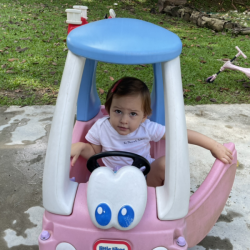 Victoire enjoying outside play.