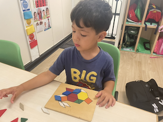 Isaac working with shape pattern matching.