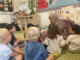 Our lovely mystery reader, Maha!