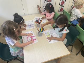 Practising tracing letter “g”!