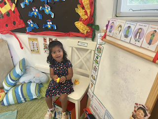 Savhara singing 5 little ducks during her show and tell .