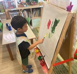 Isaac enjoys being the artist of the day.