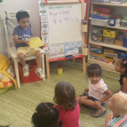 Ei shows off his clay art work to Ladybirds during show and tell!