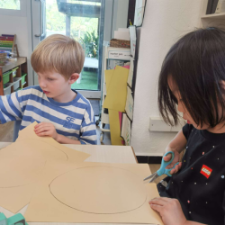 Asher and Kane cutting out their 'good egg'.