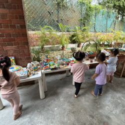The girls checking out the toy and book sale!